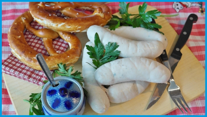A unique combination of “Weißwurst” sausages, pretzels, and sweet mustard