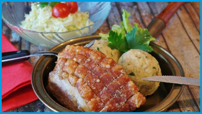 Bavarian “Schweinebraten” with dumplings and kraut salad